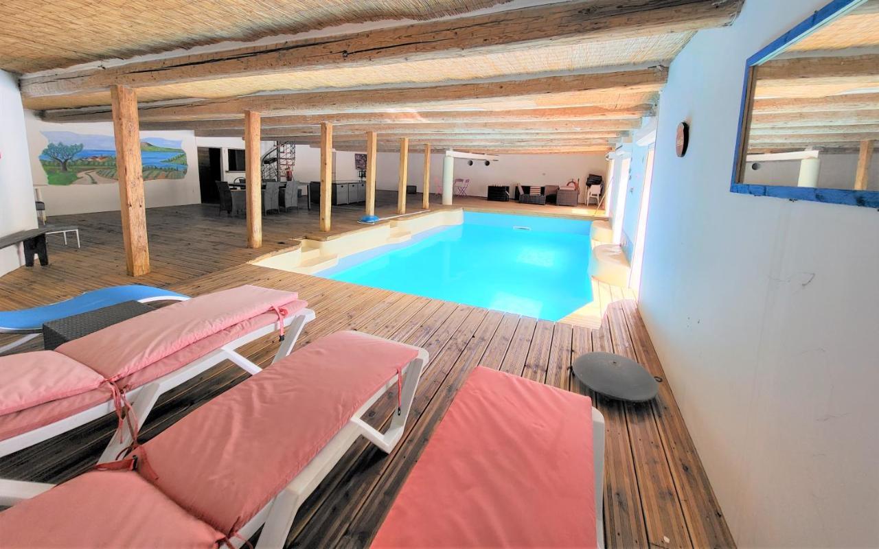 Maison 3 Chambres Avec Piscine Couverte Lespignan Exterior foto